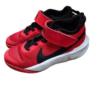 KIDS Nike 13C red tennis shoe .